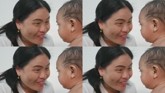 亚洲婴儿亲吻母亲高清在线视频素材下载