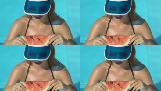 时尚的女人在游泳池里吃着西瓜片，微笑着吃着零食高清在线视频素材下载