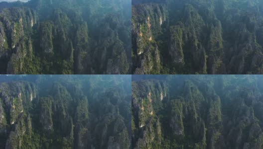 从上面俯瞰，Vang Vieng一组令人惊叹的石灰岩山脉。万荣是老挝万象省的一个旅游小镇。高清在线视频素材下载