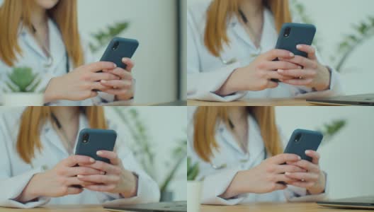白大褂女医生使用现代智能手机触摸屏设备。医生使用手机向患者发送短信，告知医疗检查结果。高清在线视频素材下载
