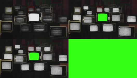 一堆复古电视与静态噪音和复古电视绿色屏幕。放大。高清在线视频素材下载