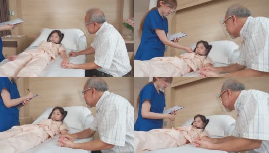 在医院的康复室里，父亲抚摸着女儿的手，安慰她高清在线视频素材下载