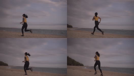 一个坚定的女人在日落时跑到外面的4k视频片段。高清在线视频素材下载
