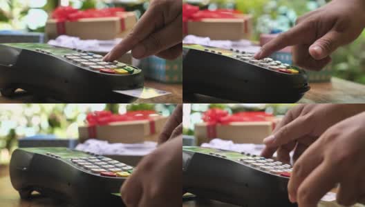 SLO MO使用带有礼品的信用卡读卡器高清在线视频素材下载