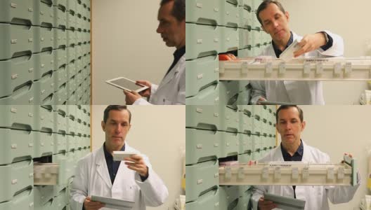 药师在储藏室使用片剂PC高清在线视频素材下载