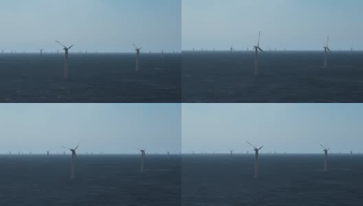 海上的风车或风力涡轮机。绿色能源环保理念，节约地球。高清在线视频素材下载