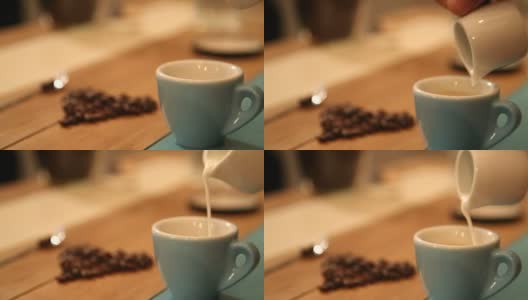 往咖啡师的咖啡里倒牛奶高清在线视频素材下载