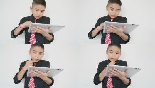 小男孩用平板电脑高清在线视频素材下载