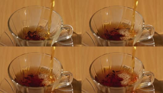 在泰国清晨的阳光下，将热茶倒入绿色的玻璃茶杯中高清在线视频素材下载