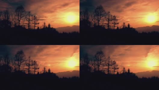 落日和层层叠叠的云在山上移动的延时拍摄高清在线视频素材下载