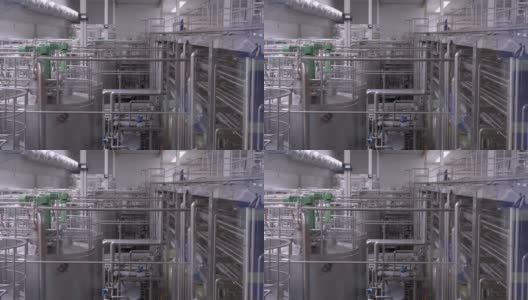 现代化牛奶加工厂的自动化生产高清在线视频素材下载