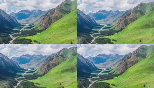 空中拍摄的新疆山脉和绿色草地景观高清在线视频素材下载