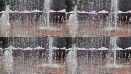 城市里的喷泉。水柱减速了。乌克兰基辅赫雷沙提克街的城市夏天。高清在线视频素材下载