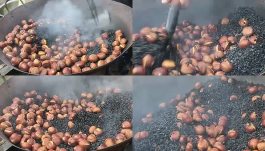 在大锅里烤栗子，北京，中国。高清在线视频素材下载