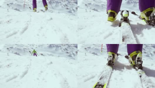 SLO MO女滑雪者进入绑定和开始高清在线视频素材下载