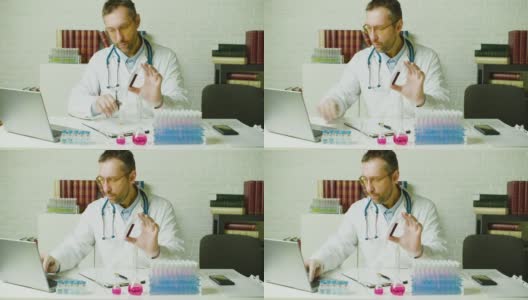 慢镜头拍摄的是一名医生在实验室写报告。研究开发现代疫苗高清在线视频素材下载