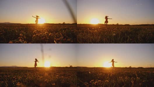 SLO MO快乐的女孩在日落的草地上旋转高清在线视频素材下载