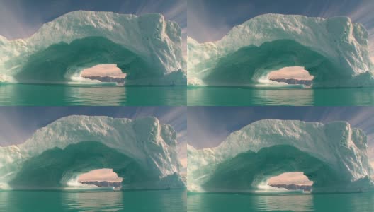 美丽的巨大冰山和一个洞格陵兰岛高清在线视频素材下载