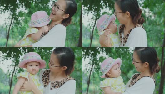 快乐的亚洲小女婴和她的母亲高清在线视频素材下载