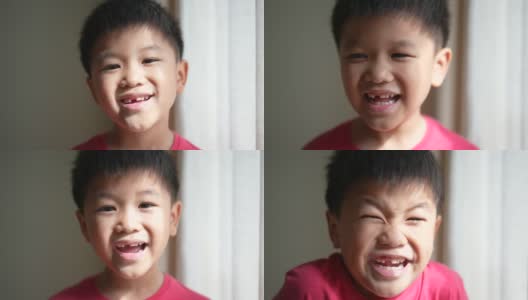 亚洲男孩展示他的乳牙和间隙牙。高清在线视频素材下载