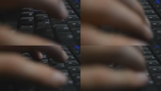 在笔记本电脑键盘上打字的特写高清在线视频素材下载