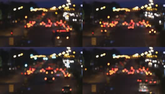 灯光运动模糊了城市中的交通高清在线视频素材下载