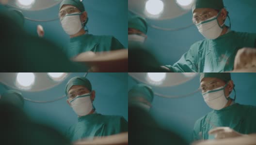 医疗队正在给危重病人动手术。高清在线视频素材下载