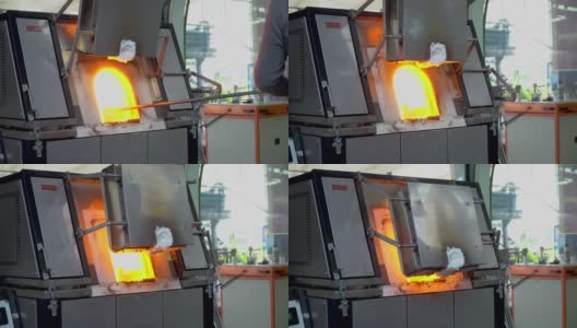 从熔炉中取出熔融玻璃高清在线视频素材下载