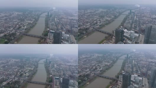 河流流经城市的空中全景。住宅区和工业区。德国美因河畔的法兰克福高清在线视频素材下载