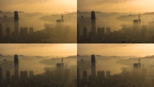 在日出下的雾中，香港市中心的摩天大楼高清在线视频素材下载