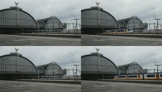 驶离阿姆斯特丹中央车站的旅客列车高清在线视频素材下载