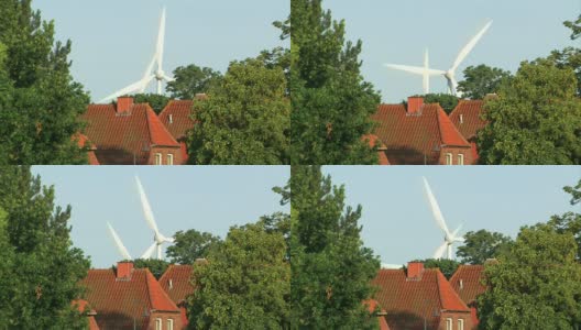 发电的风车附近的一个村庄高清在线视频素材下载