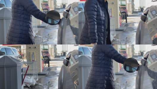 在冬天，汽车上的油箱加油口的口袋。概念:汽油价格。高清在线视频素材下载