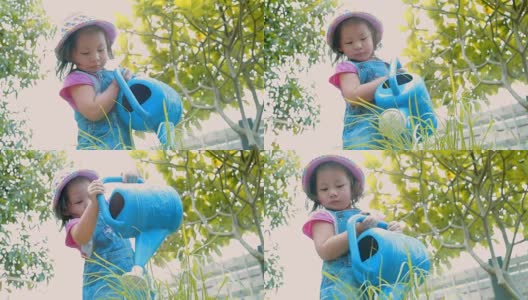 小女孩在花园里给植物浇水\理念:关爱自然高清在线视频素材下载
