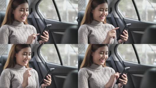 SLO MO女人在车里使用智能手机高清在线视频素材下载