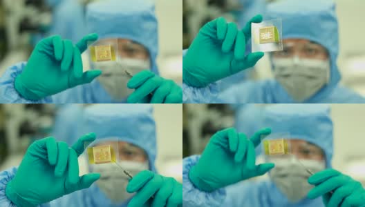实验室洁净室的微芯片技术员高清在线视频素材下载