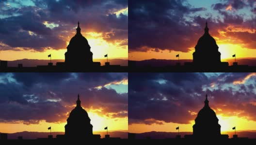 日落华盛顿剪影。红日彩云的美国国会大厦，美国。高清在线视频素材下载