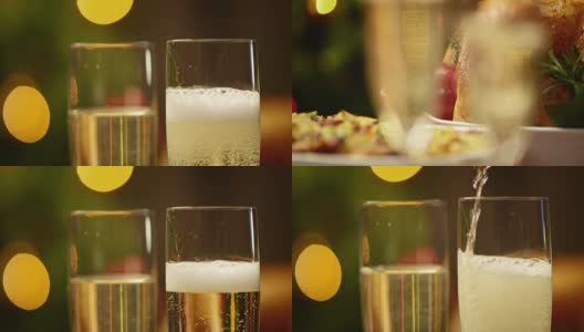 把香槟杯倒在节日餐桌上的SLO MO高清在线视频素材下载