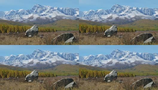 阿尔泰高原上的巨石埃希提克尔与北Chuisky山脊和冰川在背景上高清在线视频素材下载