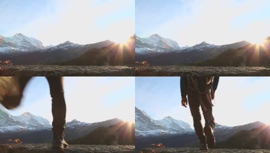 男性徒步者在日出时向山走去高清在线视频素材下载