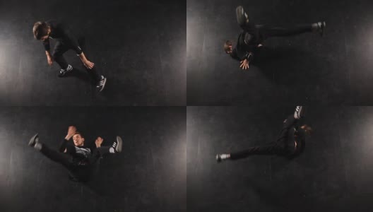 B-boy在摄影棚里以黑色为背景跳霹雳舞高清在线视频素材下载
