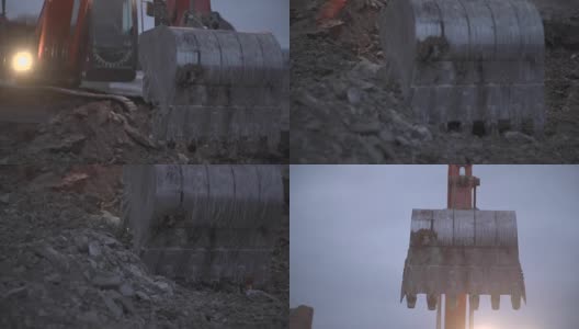 挖掘机在夜间运输地面高清在线视频素材下载