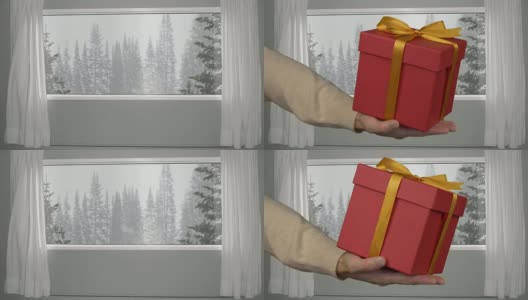 平安夜送红礼盒的男人，窗外森林里飘着雪花高清在线视频素材下载