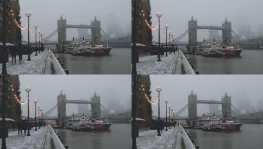 英国伦敦塔桥周围的冬季景象和降雪高清在线视频素材下载