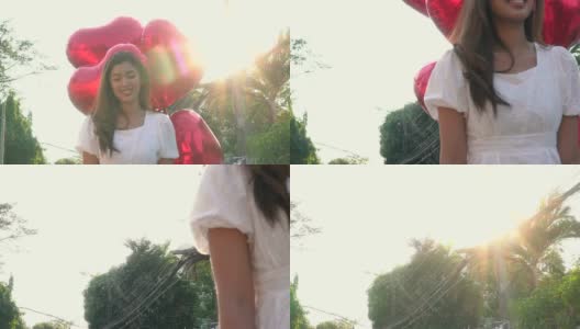 性感的亚洲女人与气球在公园高清在线视频素材下载