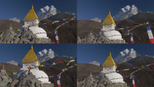 位于尼泊尔喜马拉雅山的珠穆朗玛峰(EBC)大本营的佛塔上挂着经幡。替身拍摄高清在线视频素材下载