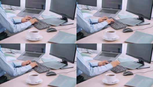 亚洲女程序员，在办公室用电脑输入源代码来开发程序或应用程序高清在线视频素材下载
