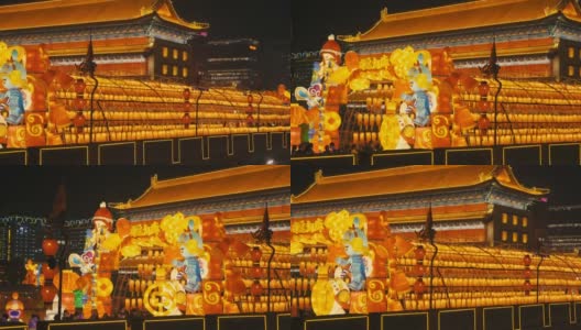 中国陕西西安，古代城墙上的灯笼庆祝中国春节高清在线视频素材下载