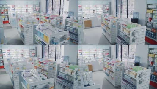 大现代药房药房摆满了现代医药，药品，维生素盒子，药丸，补品，保健产品的包装。药剂师站在柜台。远景高清在线视频素材下载