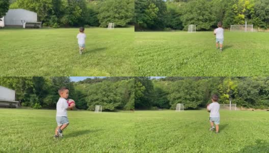 一个小男孩在足球场上玩耍高清在线视频素材下载